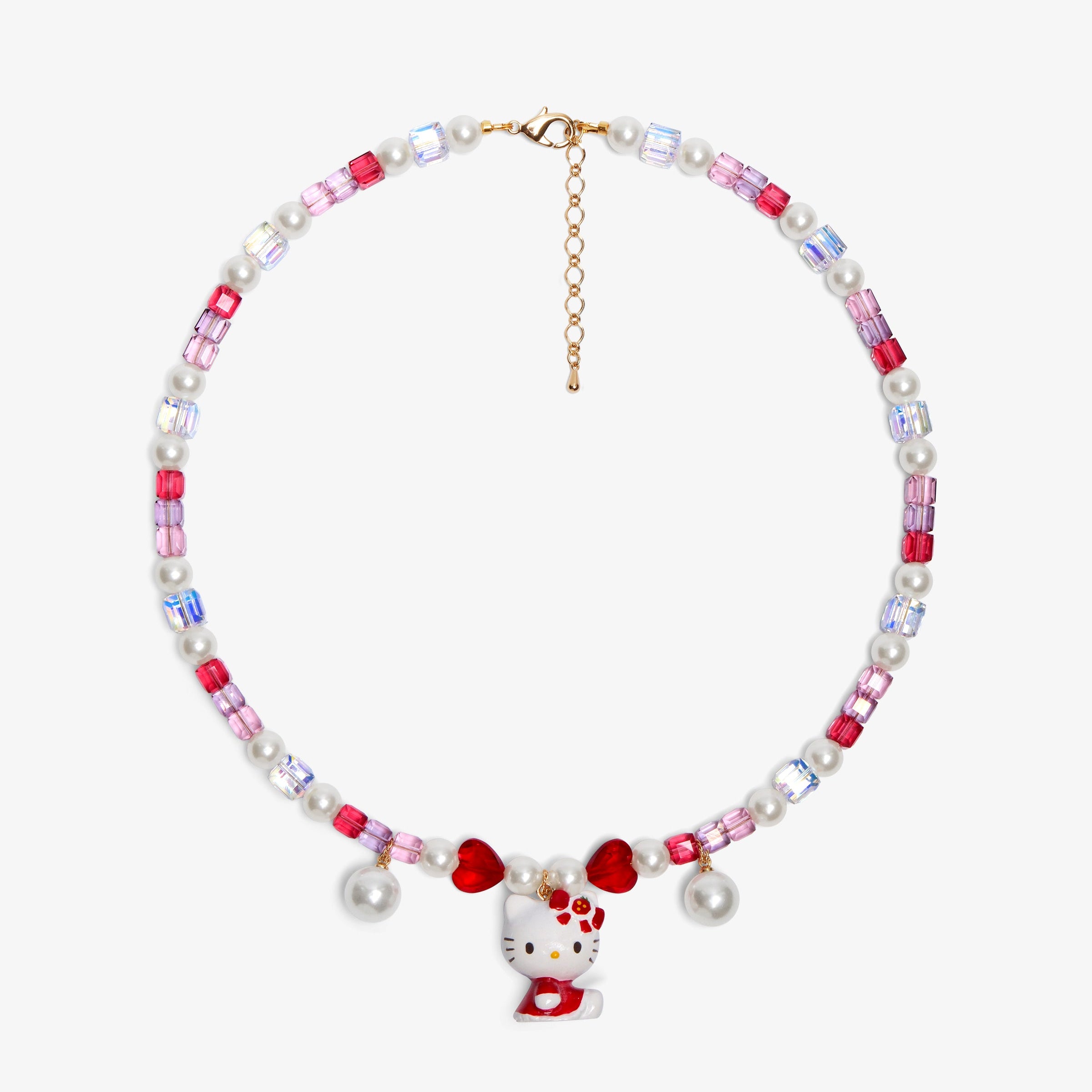 Close-up of a handmade Swarovski crystal charm necklace with crystals, pearls and sweetheart-inspired collectible charm details