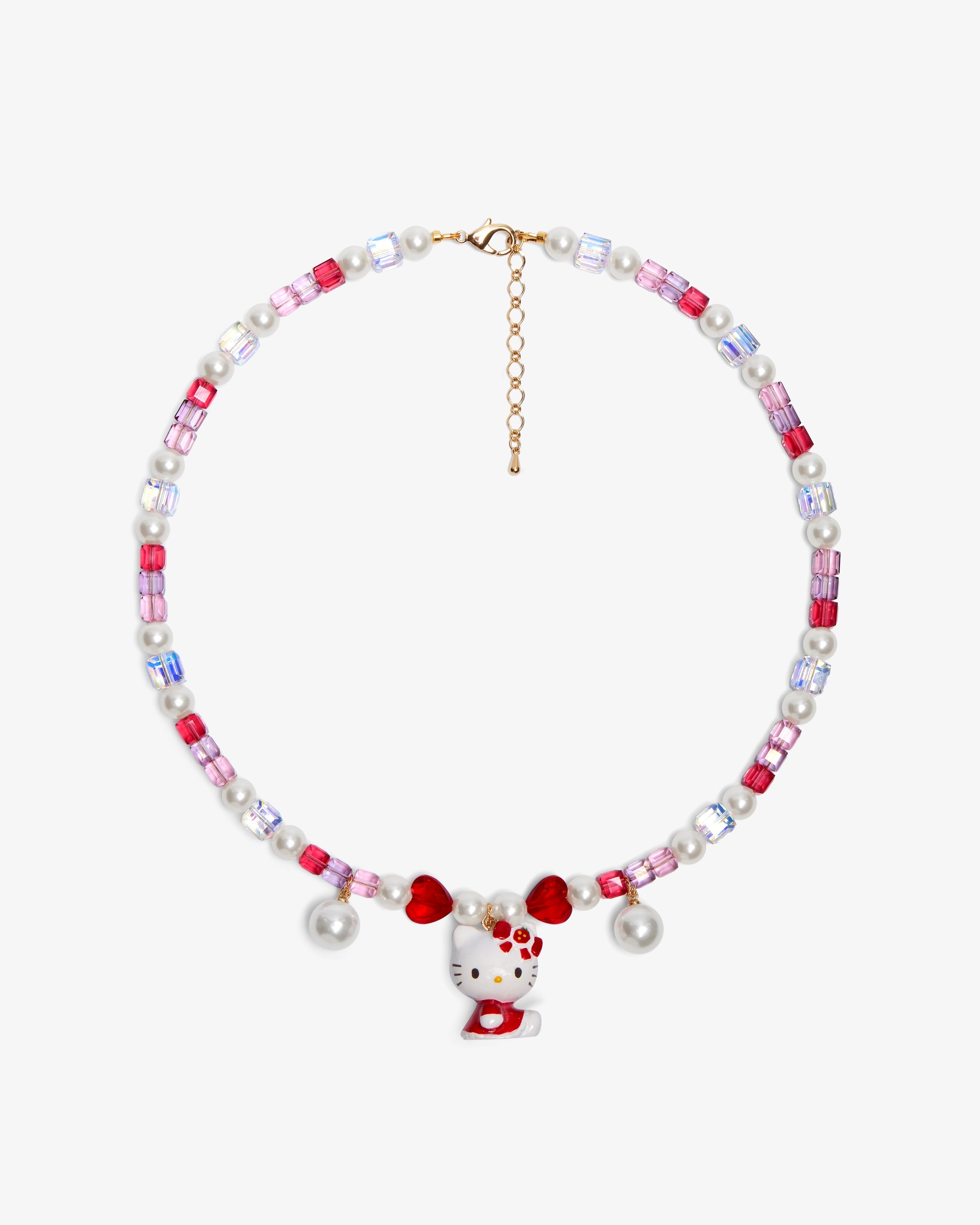 Close-up of a handmade Swarovski crystal charm necklace with crystals, pearls and sweetheart-inspired collectible charm details