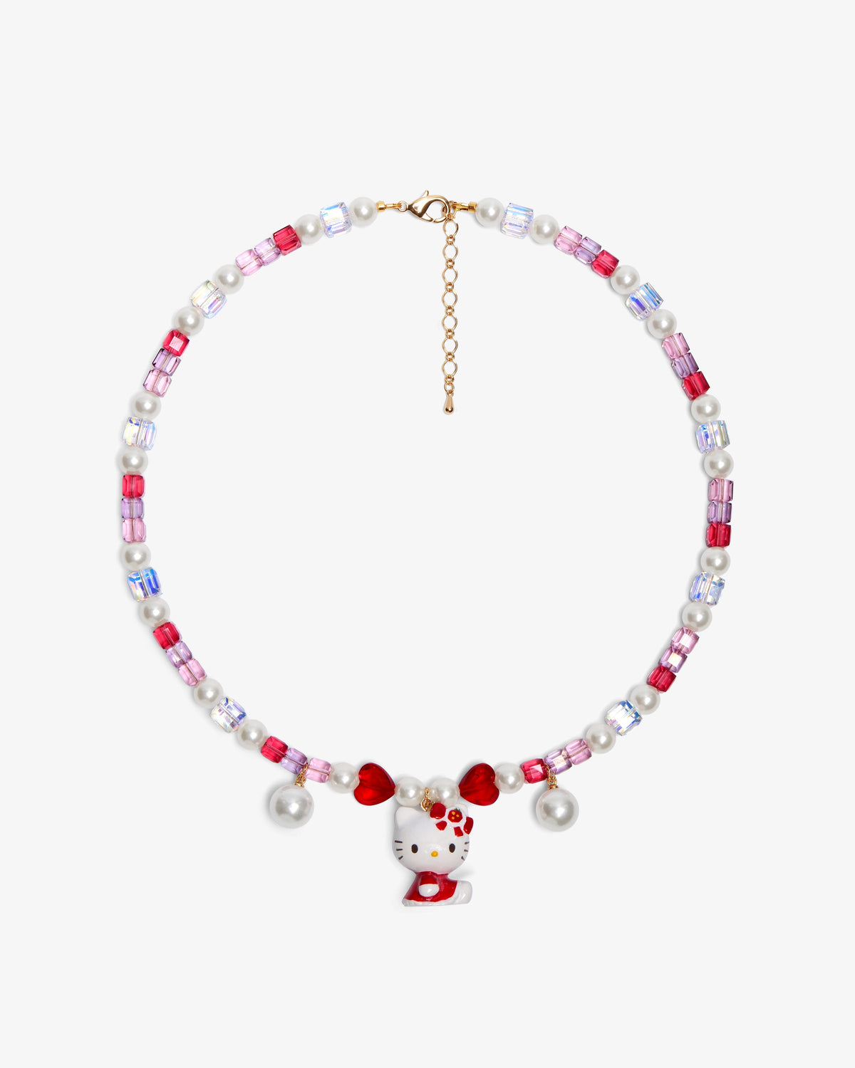 Close-up of a handmade Swarovski crystal charm necklace with crystals, pearls and sweetheart-inspired collectible charm details