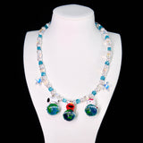 Product photo of Global Adventure Charm Necklace by Shinora Studio.