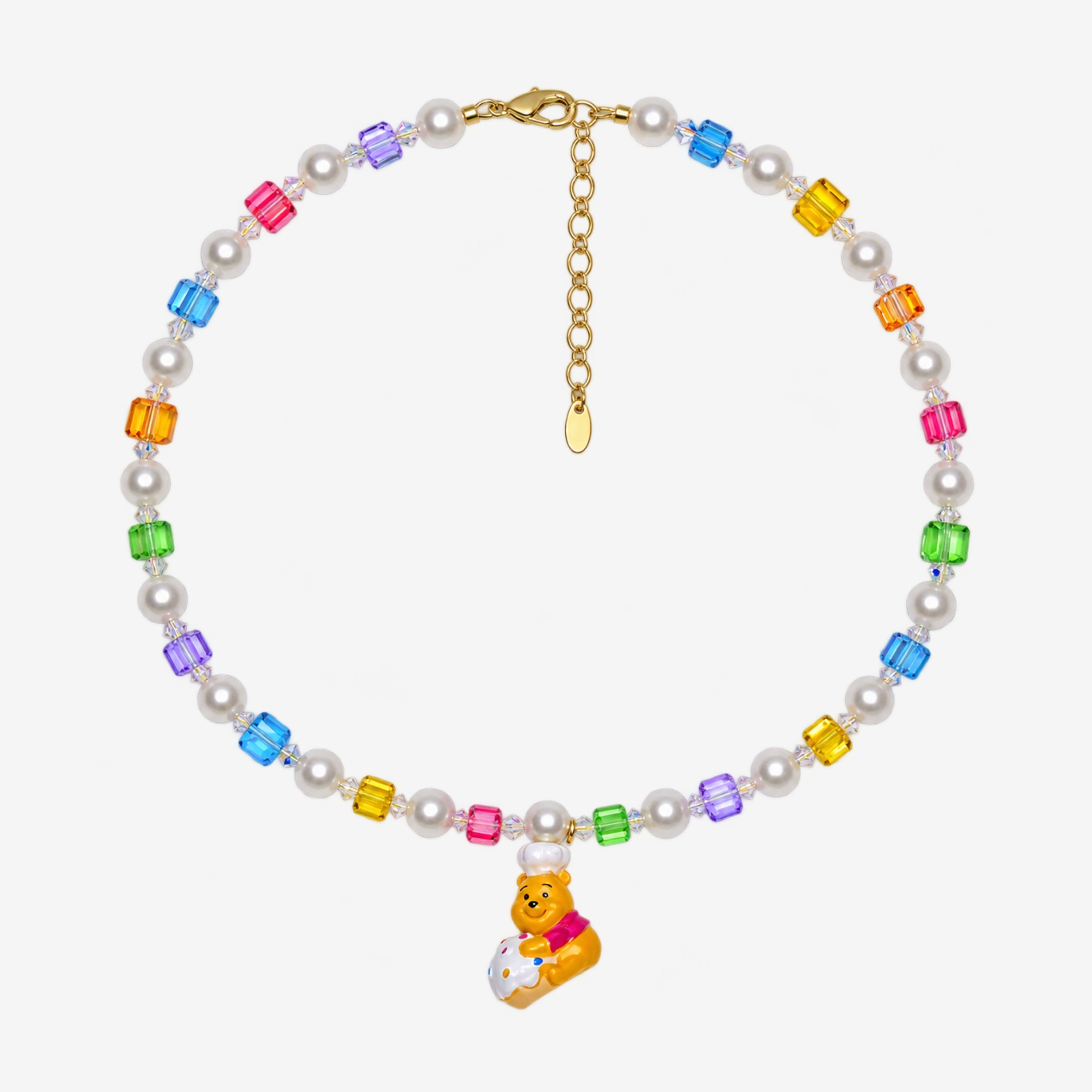 Rainbow Swarovski crystal cube and white crystal pearl necklace with a yellow bear charm wearing a white chef hat.