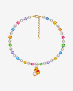 Rainbow Swarovski crystal cube and white crystal pearl necklace with a yellow bear charm wearing a white chef hat.