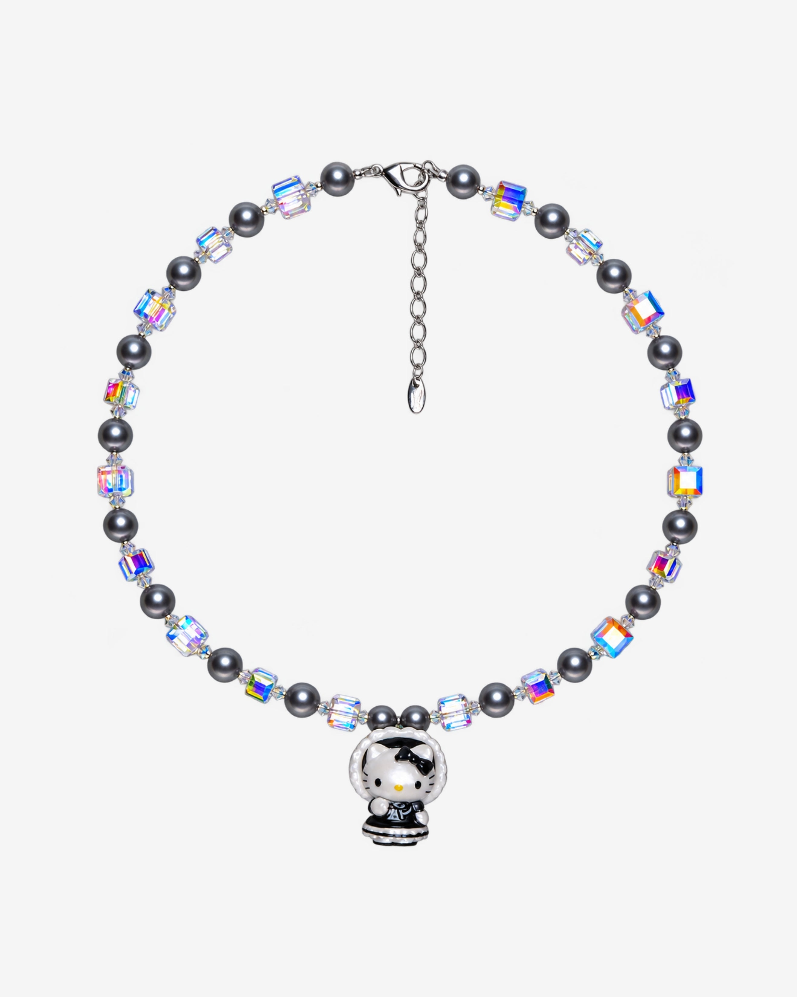 Necklace with dark gray Swarovski crystal pearls, iridescent crystal cubes and a cat charm in a black bonnet outfit with white trim.