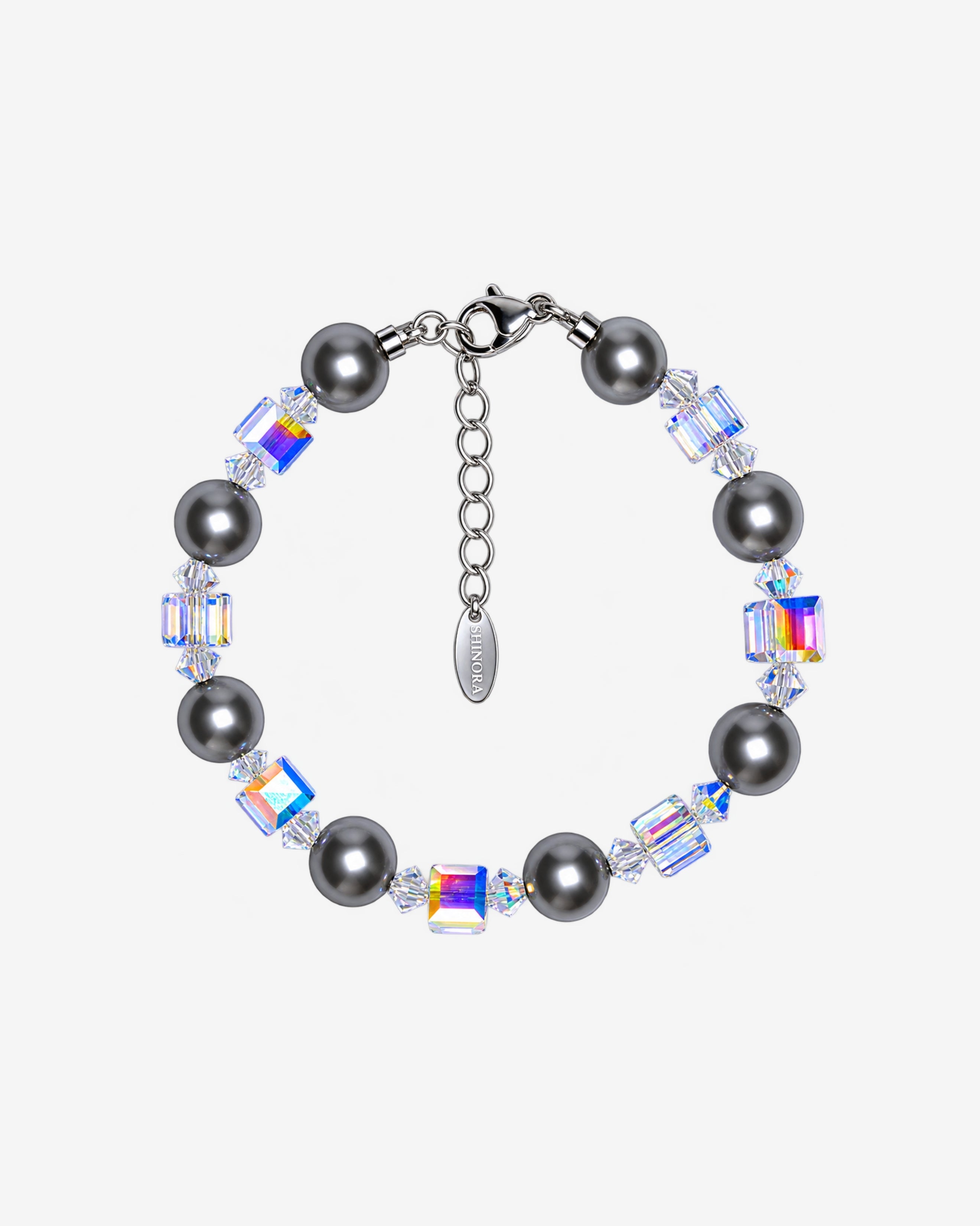 Bracelet with dark gray Swarovski crystal pearls, alternating iridescent crystal cubes, clear spacers and a silver-tone clasp.