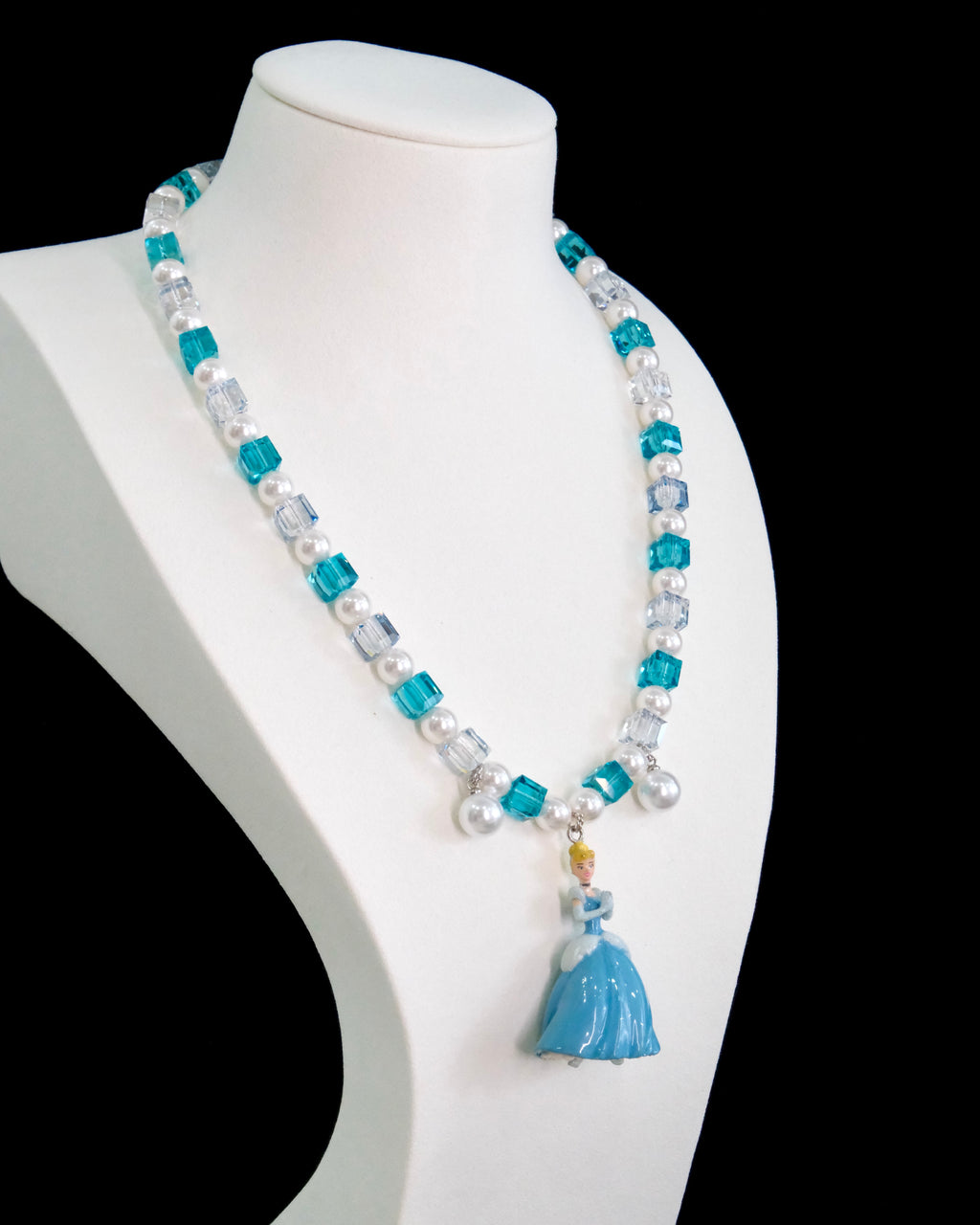 Model wearing handmade blue crystal charm necklace with silver Swarovski beads and pearls
