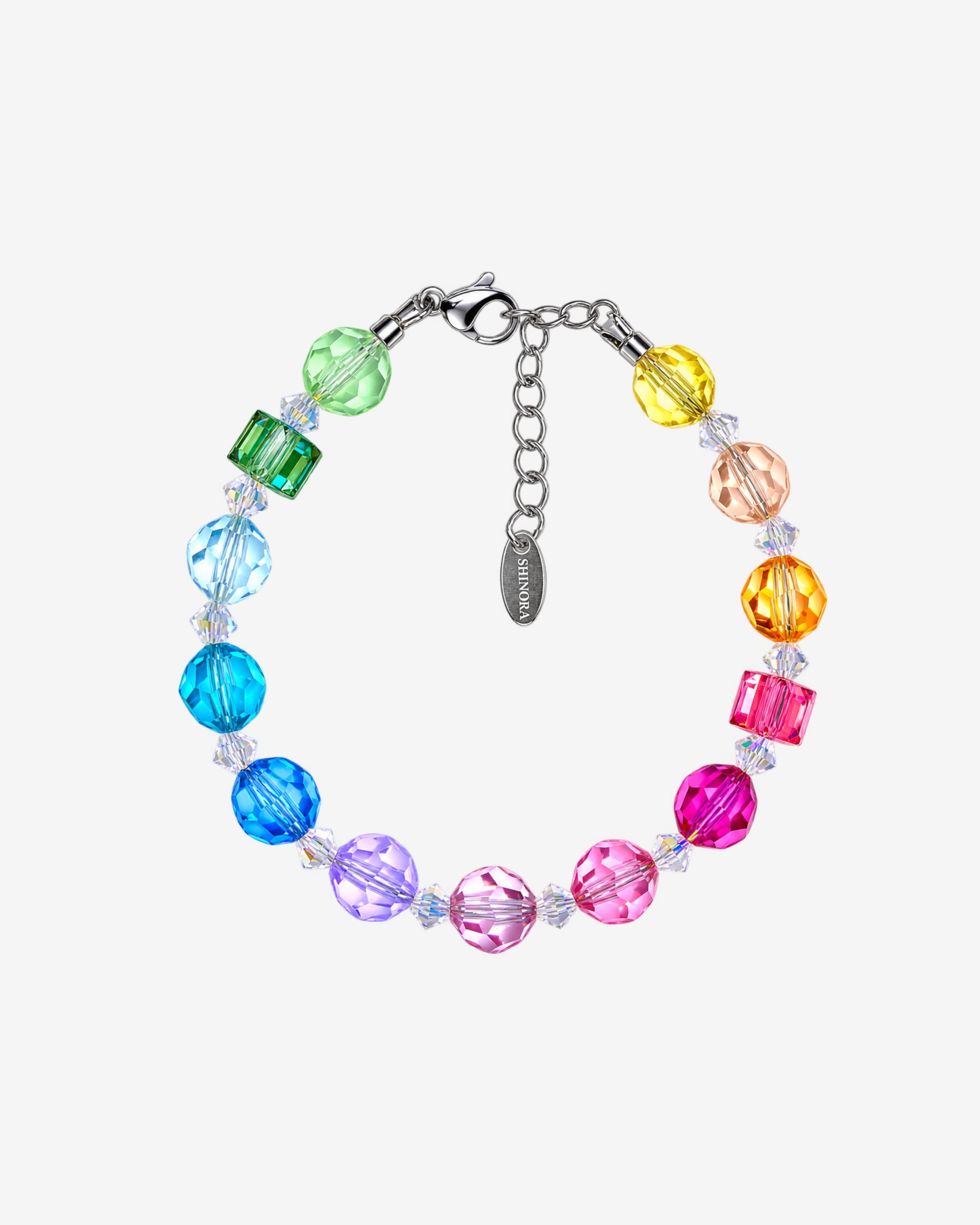 Bracelet with rainbow Swarovski crystal rounds, green and pink cubes, clear spacers and a silver-tone clasp.