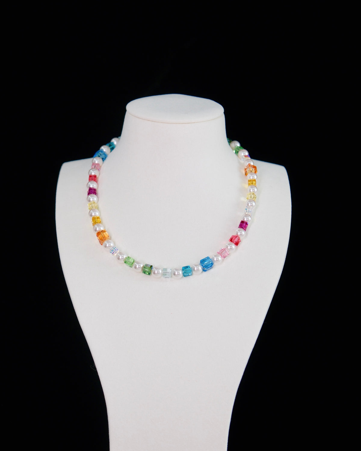 Rainbow Swarovski crystal and pearl necklace on display bust - handmade multicolor cube beads by ShinoraStudio
