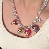 Gift-ready ShinoraStudio packaging for a handmade Swarovski crystal charm necklace with retro-inspired collectible charm details