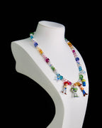 Gift-ready ShinoraStudio packaging for a handmade rainbow Swarovski crystal charm necklace with rainbow-inspired collectible charm details