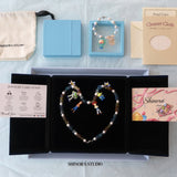 Gift-ready ShinoraStudio packaging for handmade jewelry with Swarovski crystals, pearls, and vintage-inspired charm details