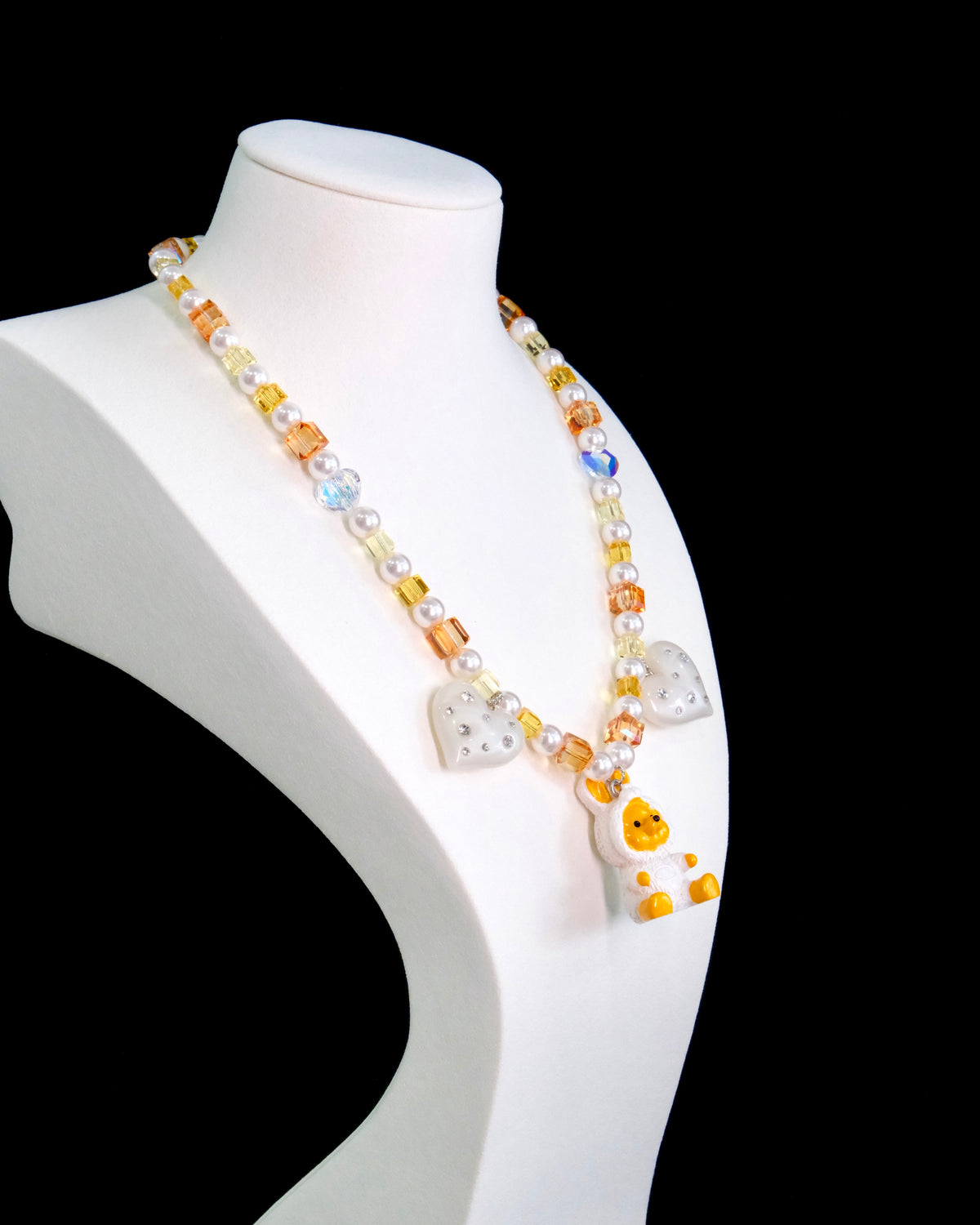 Gift-ready ShinoraStudio packaging for a handmade Swarovski crystal charm necklace with holiday-inspired collectible charm details