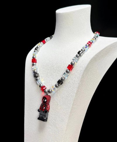 Gift-ready ShinoraStudio packaging for a handmade Swarovski crystal charm necklace with city-inspired collectible charm details