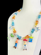 Vintage Toy Story character pendants on handmade Y2K multi-charm Swarovski necklace - detail view